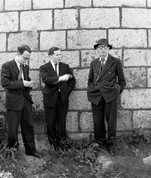 Celebrating the first ever Bloomsday on Wednesday, 16th June 1954 - Anthony Cronin, John Ryan and Patrick Kavanagh at the Martello Tower, Sandycove, Dublin. NLI ref.: WIL pk 11(9)