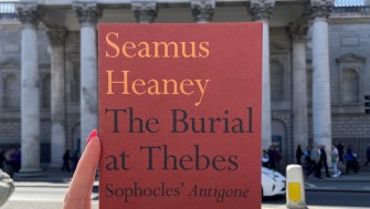 image of seamus heaney's burial at thebes in front of the bank of ireland building 
