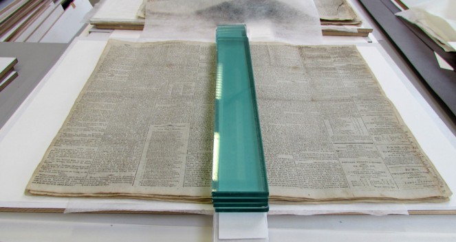 Drying of the Japanese paper repairs under weight