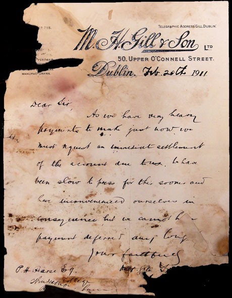 Mould has stained this document pink, black and orange