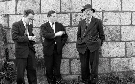 Celebrating the first ever Bloomsday on Wednesday, 16th June 1954 - Anthony Cronin, John Ryan and Patrick Kavanagh at the Martello Tower, Sandycove, Dublin. NLI ref.: WIL pk 11(9)